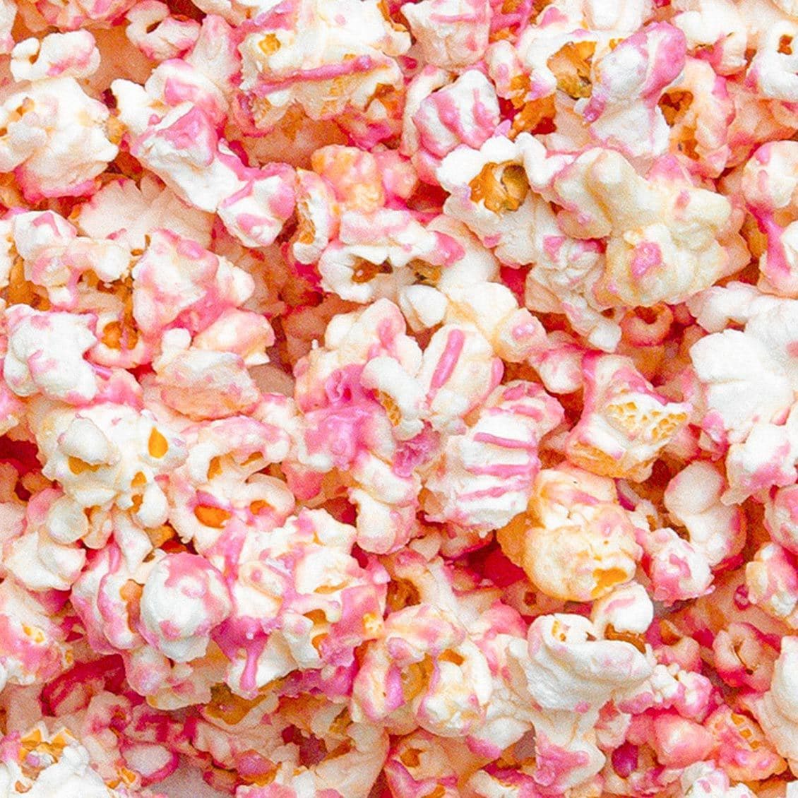 close up of strawberry shortcake drizzled popcorn